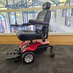 Cherry red Jazzy Select Elite (TSS-300 by The Scooter Store) front view with new batteries installed