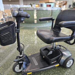 Pride Go-Go Elite Traveller 3-wheel mobility scooter in metallic silver with front basket – excellent used condition